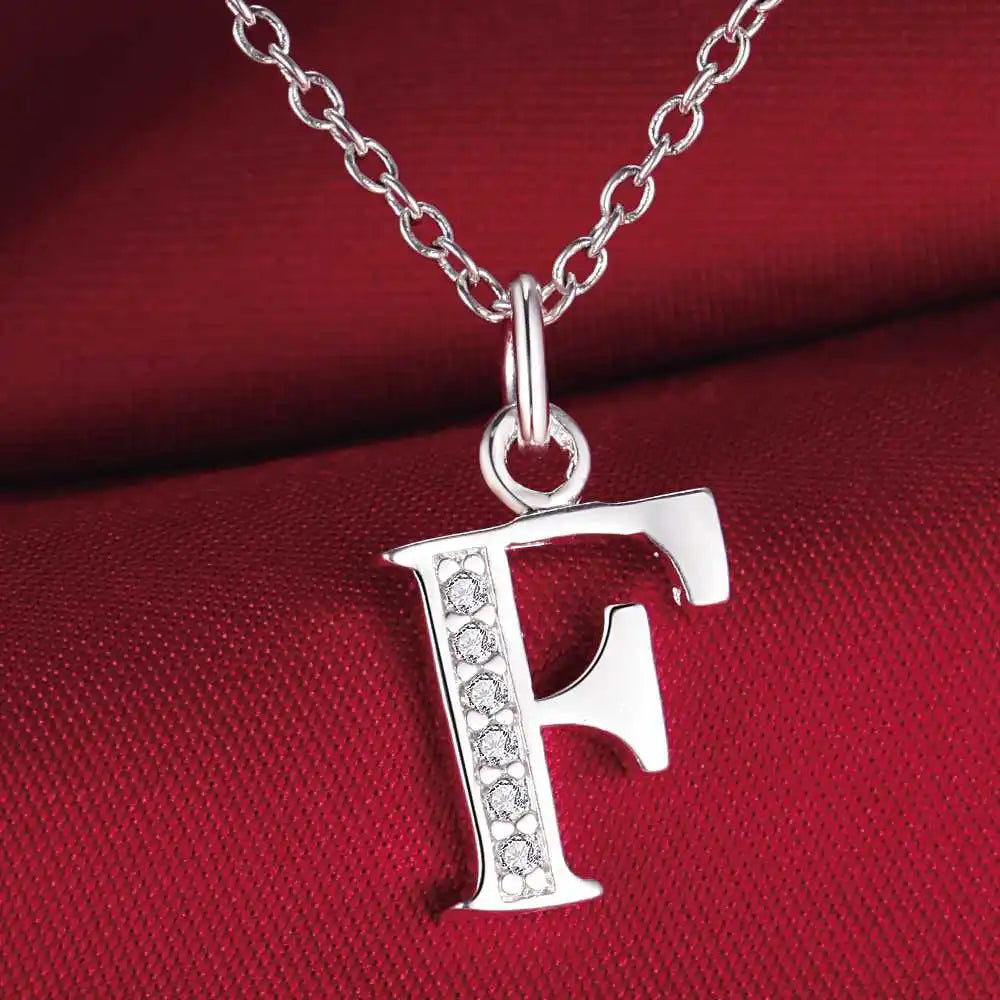 Collar largo con colgante inicial f