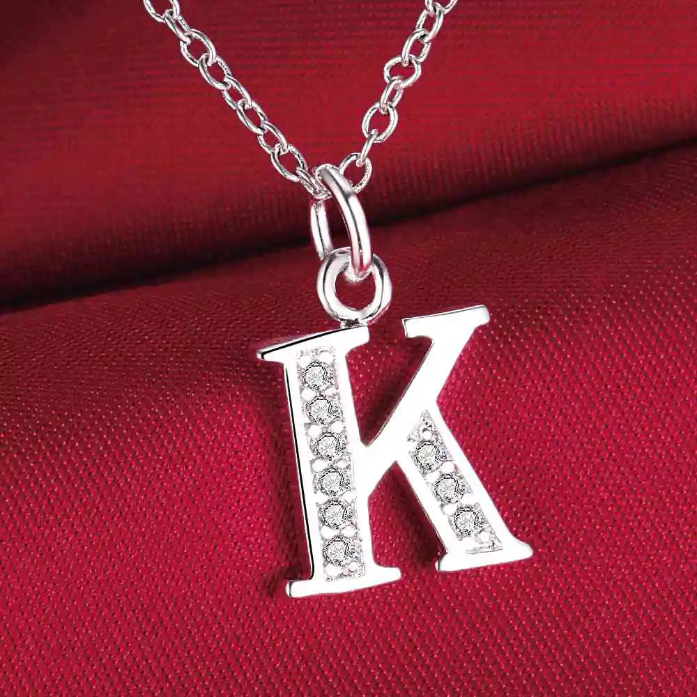 Collar largo con colgante inicial k