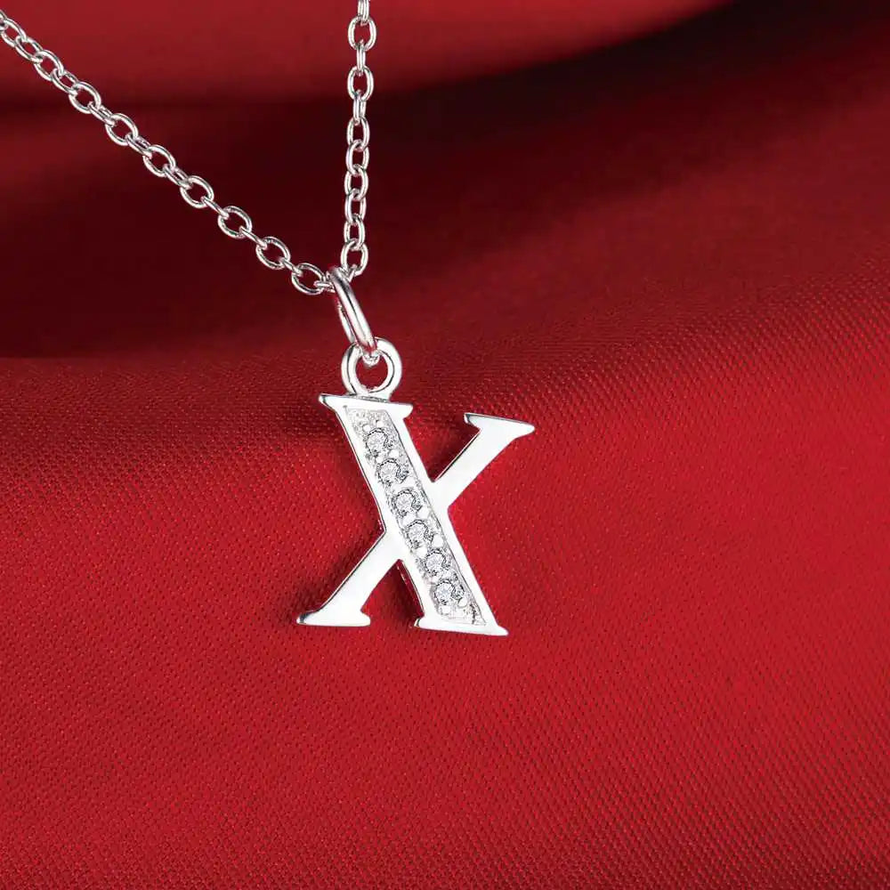 Collar largo con colgante inicial x