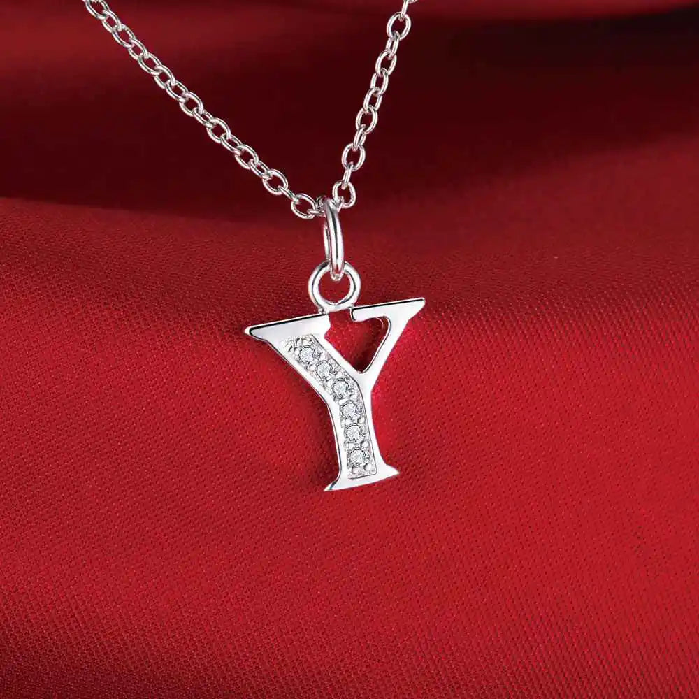 Collar largo con colgante inicial y