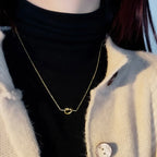 Collar con colgante de lazo para mujer