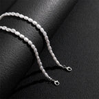 Collar con colgante de perla ovalada
