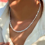 Collar con colgante de perla ovalada
