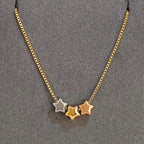 Collar con colgantes de triple estrella bicolor