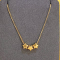 Collar con colgantes de triple estrella de oro