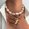 Lote de 2 collares bohemios de conchas y colgante de diente de tiburón blanco