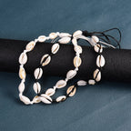 Collar con concha cauri blanco 
