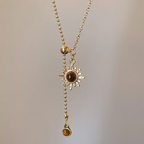 Gold tie necklace with sunburst charms and tiger's eye stones