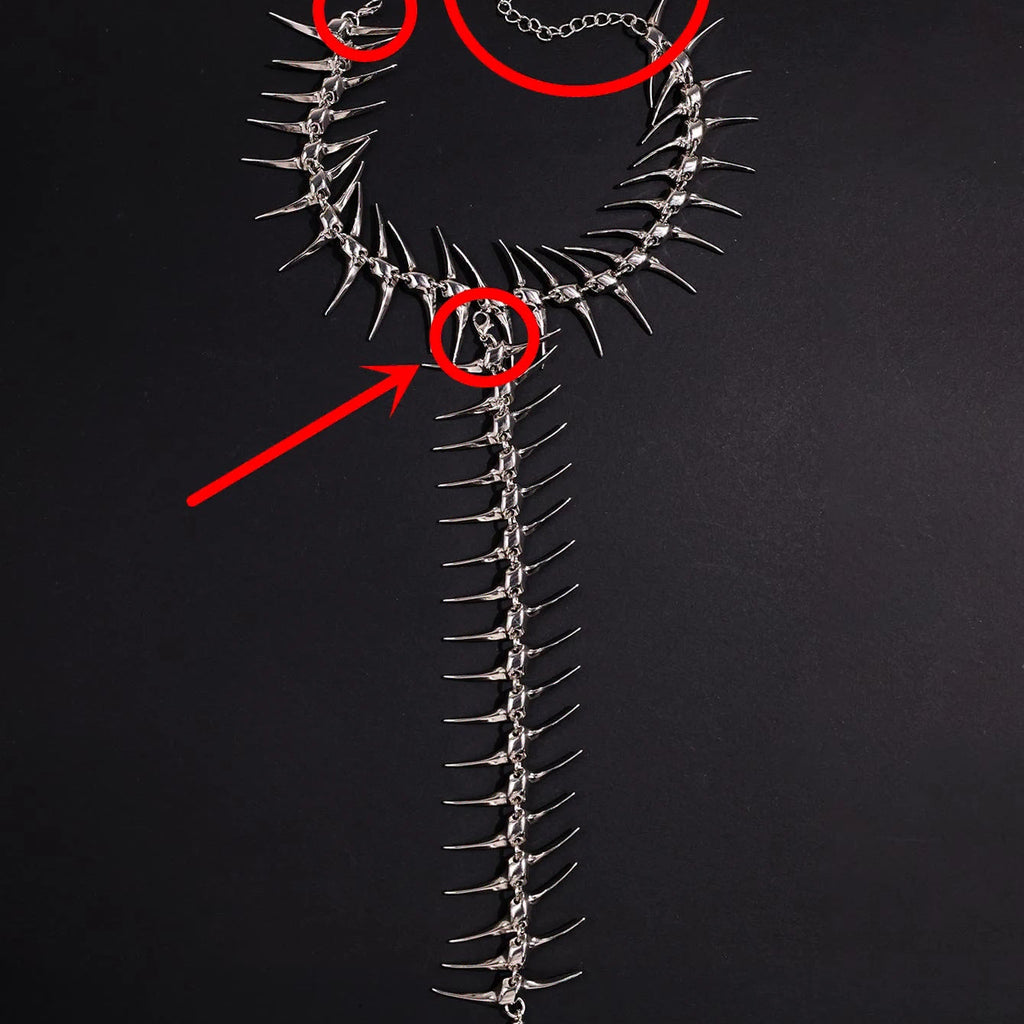 Back necklace with skeleton and skull pendant