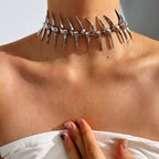 Back necklace with skeleton and skull pendant 