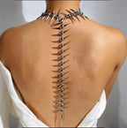 Back necklace with skeleton and skull pendant silver