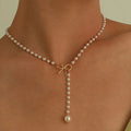 Collar de Perlas con Colgante de Nudo blanco