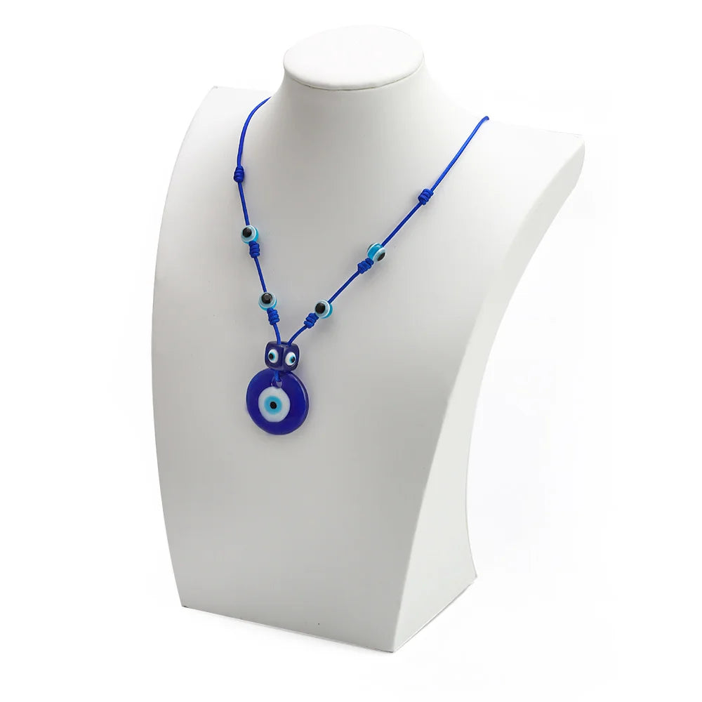 Rope necklace with large blue eye pendant