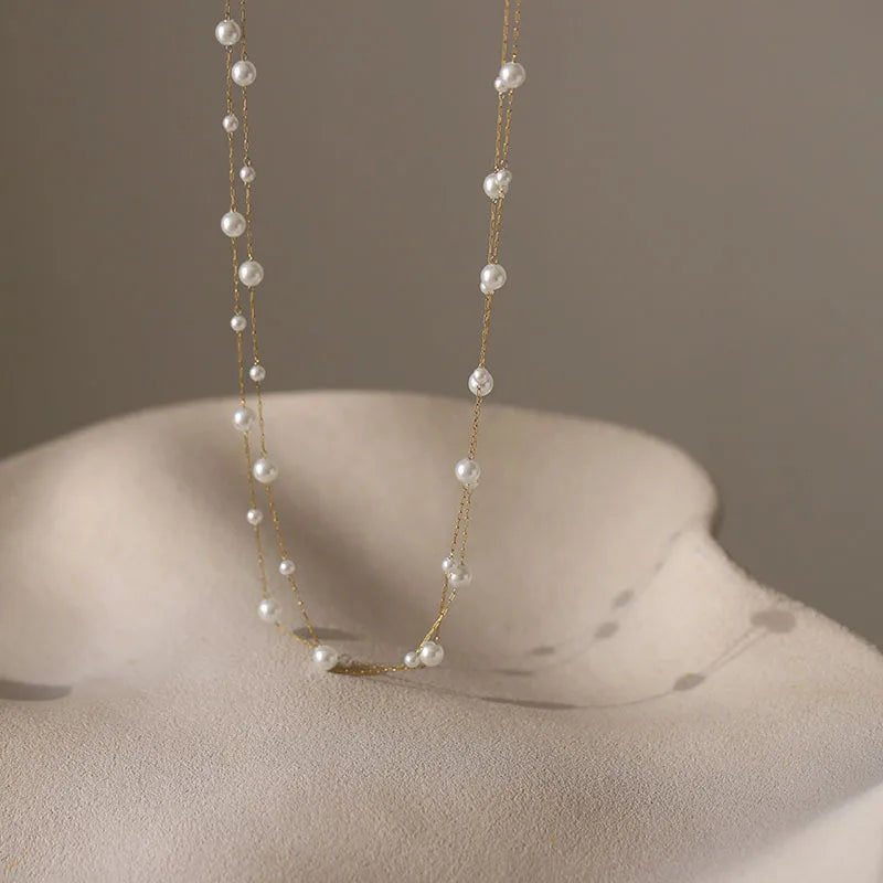 Collar de doble fila con colgante de perla