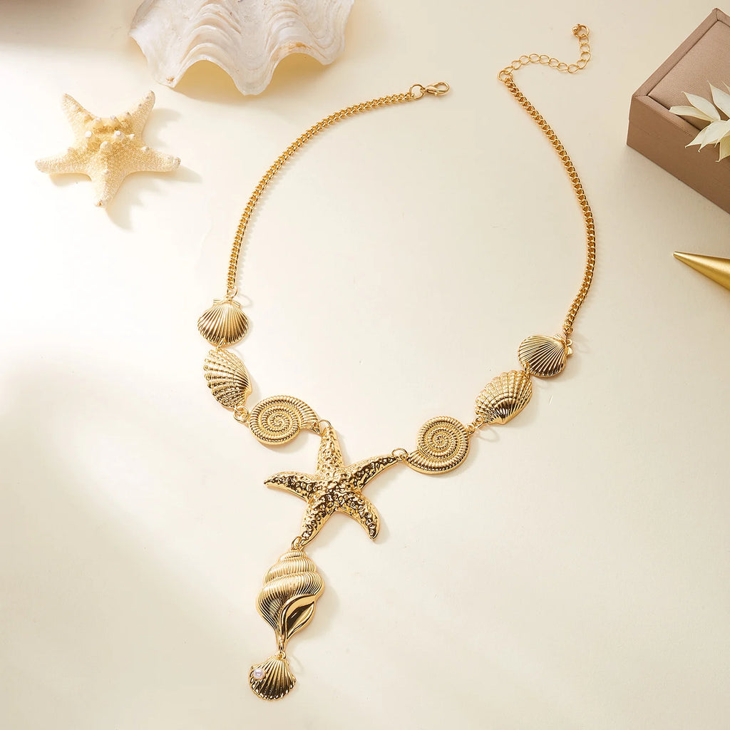 Collar en Y de concha y estrella de mar