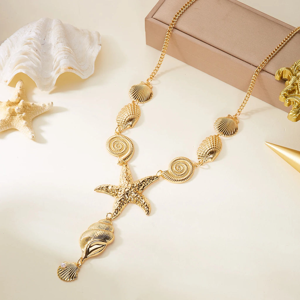 Collar en Y de concha y estrella de mar