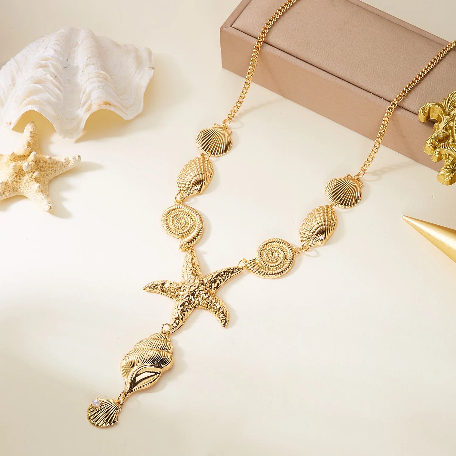 Collar en Y de concha y estrella de mar