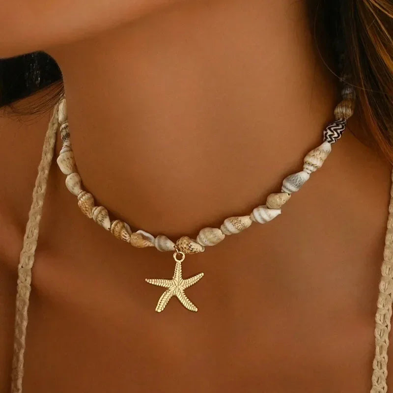 Collar y colgante con concha y estrella de mar