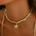 Collar y colgante con concha y estrella de mar
