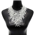 Collar y colgante babero coral blanco