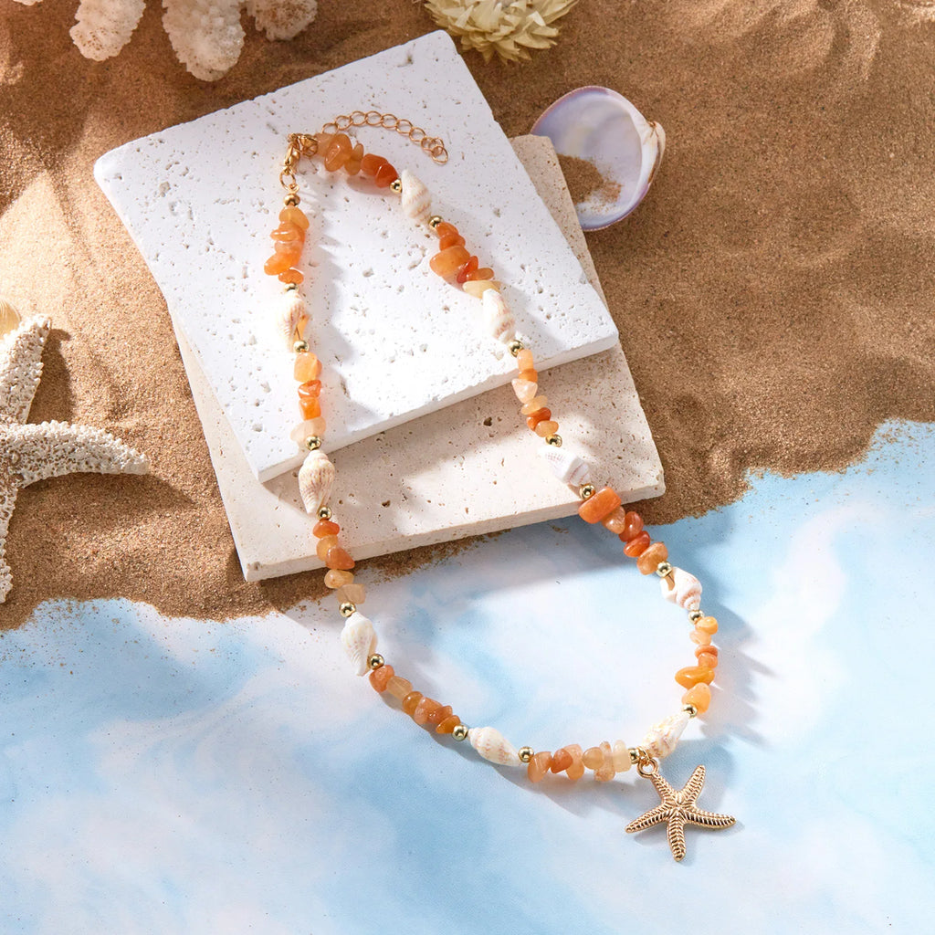 Collar y su colgante con forma de concha para mujer naranja