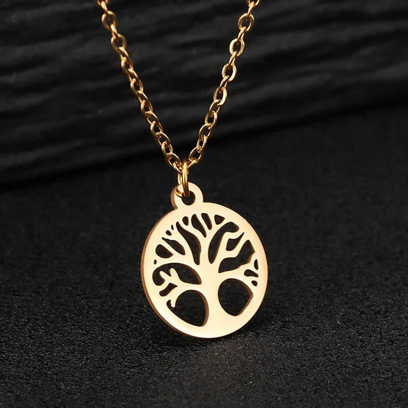 Collar fino con colgante redondo calado árbol de la vida oro