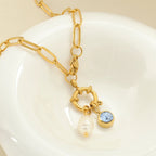 Collar de eslabones con colgante de perla y piedra de nacimiento de abril