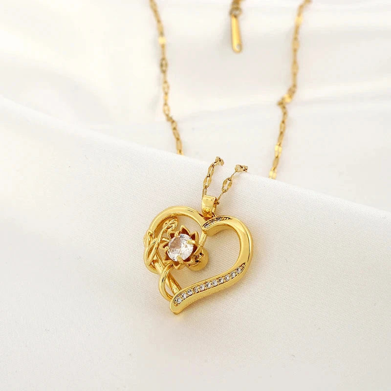 Collar colgante con corazón y flor giratoria antiestrés