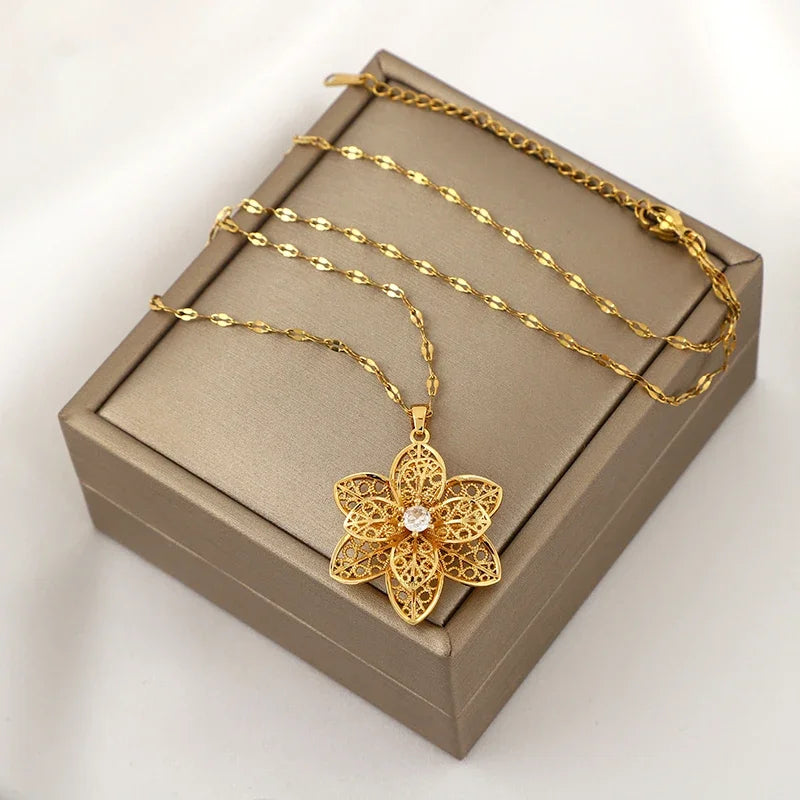 Collar colgante con bonita flor giratoria anti-estrés