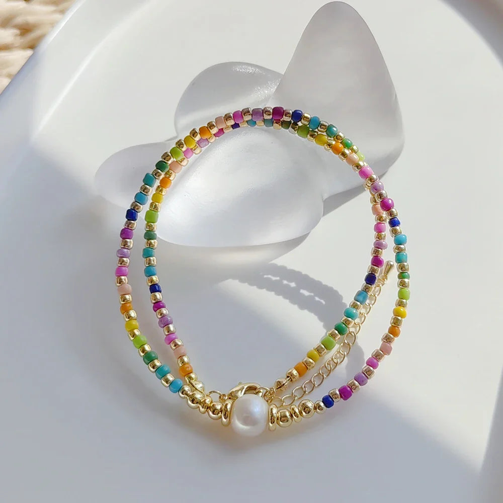Collar gargantilla con colgante de arcoíris y perlas