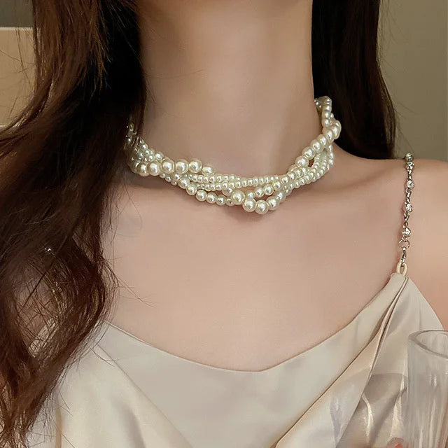 Collar trenzado con colgante de perla