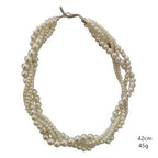 Collar trenzado con colgante de perla