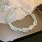 Collar trenzado con colgante de perla