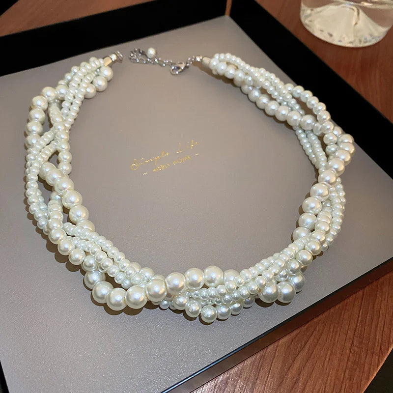 Collar trenzado con colgante de perla