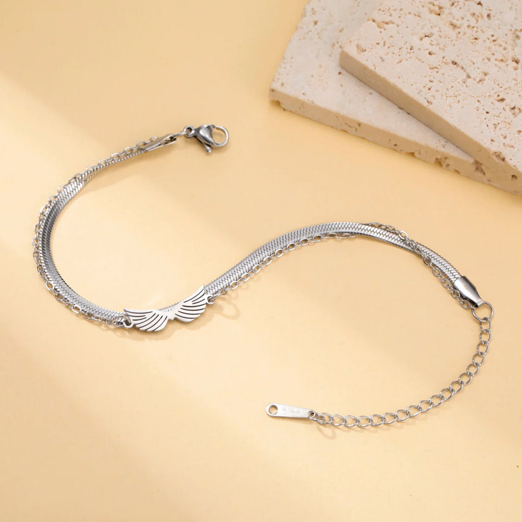 Pulsera doble alas de ángel plata