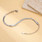 Pulsera doble alas de ángel plata