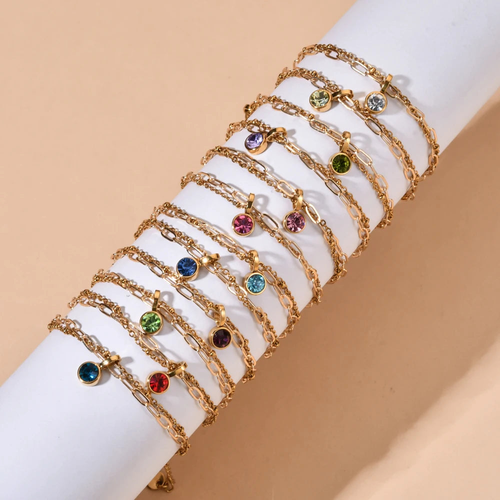 Pulsera doble dorada con piedra natal de enero