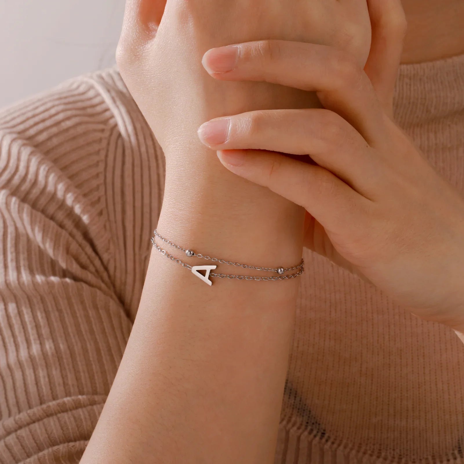 Pulsera de doble inicial oro y plata 