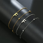 Pulsera de doble inicial oro y plata  f