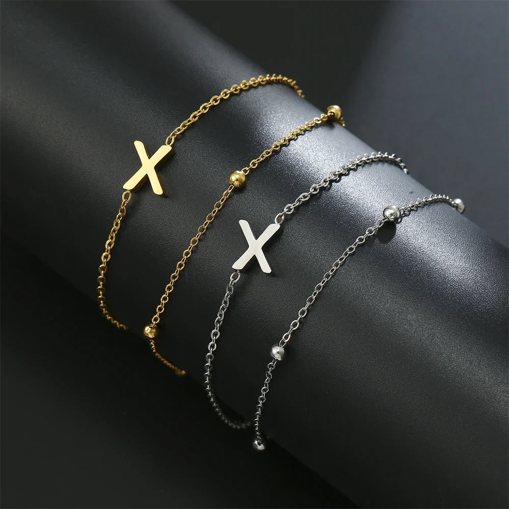 Pulsera de doble inicial oro y plata  x