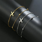 Pulsera de doble inicial oro y plata  x