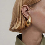 Imponentes Pendientes de Botón Gota de Agua oro