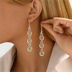 Pendientes largos colgantes en espiral