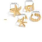 Lote de 4 anillos de conchas y estrellas de mar