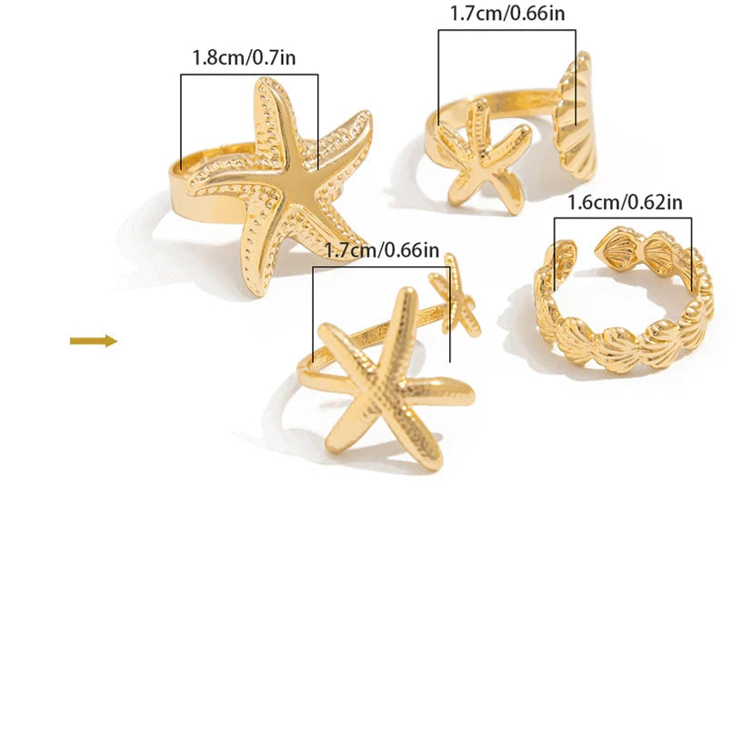 Lote de 4 anillos de conchas y estrellas de mar