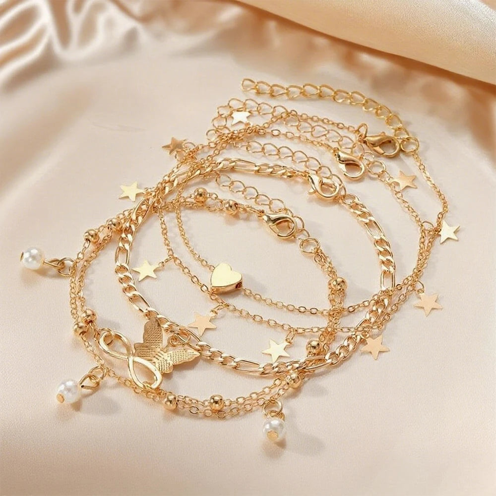 Lote de 5 tobilleras estrella, infinito, mariposa, perlas y corazón