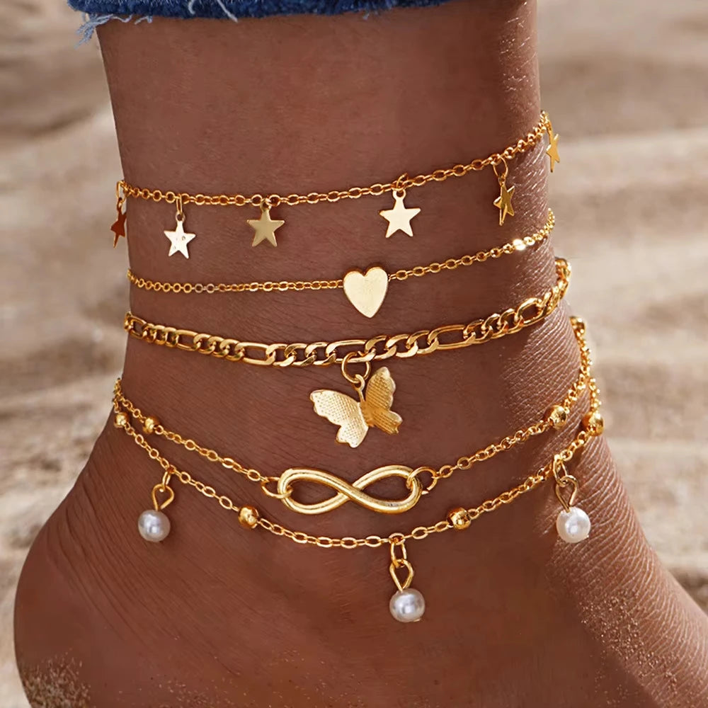 Lote de 5 tobilleras estrella, infinito, mariposa, perlas y corazón