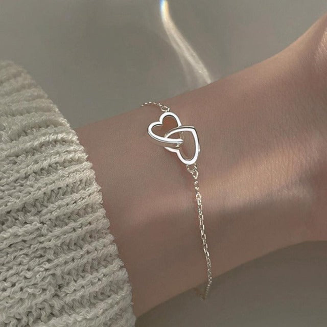 Pulsera Doble Corazón Amuleto de la Suerte