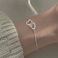 Pulsera Doble Corazón Amuleto de la Suerte