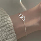 Pulsera Doble Corazón Amuleto de la Suerte